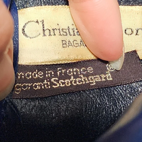 Christian Dior Boston Trotter. Small spots ext. Int dryness NO peeling or sticky